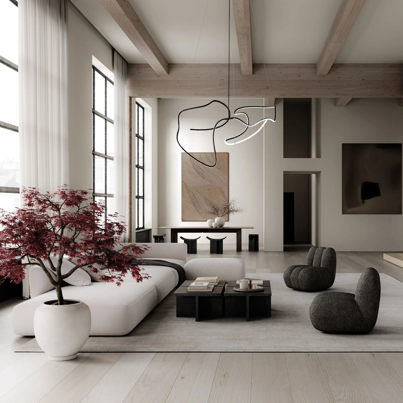 Designer-Sessel in warmem Taupe im stilvoll eingerichteten Wohnraum